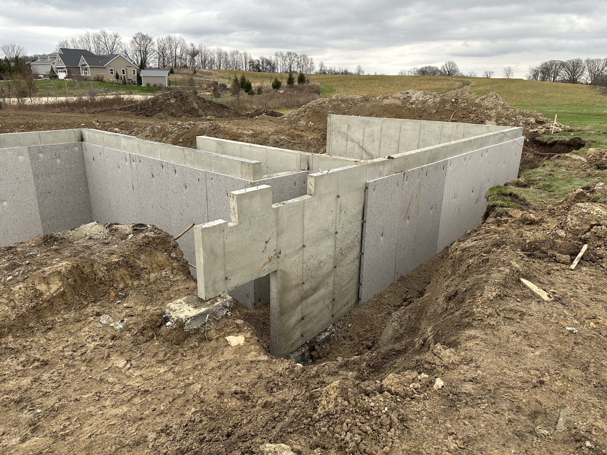 INSULDRI foundation insulation shown installed on foundation walls.
